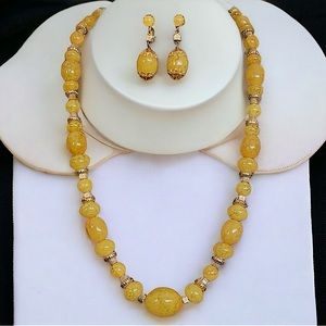 Hong Kong bold Lemon lucite Necklace Set. The Necklace is 28” Long end to end.